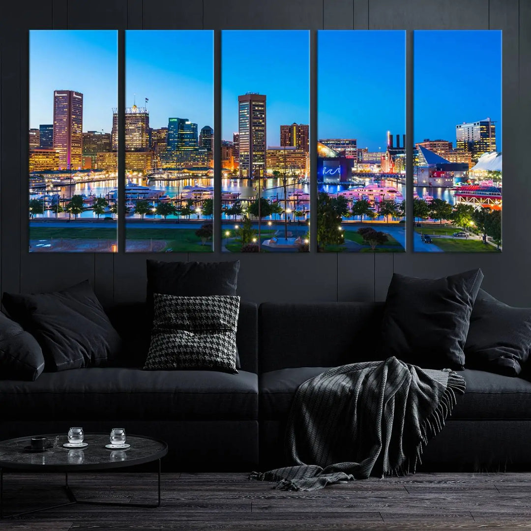 The Baltimore City Lights Blue Skyline Cityscape View Wall Art Canvas Print, a three-panel depiction of a city skyline at dusk on museum-quality canvas, adorns the area, showcasing an elegant evening cityscape.