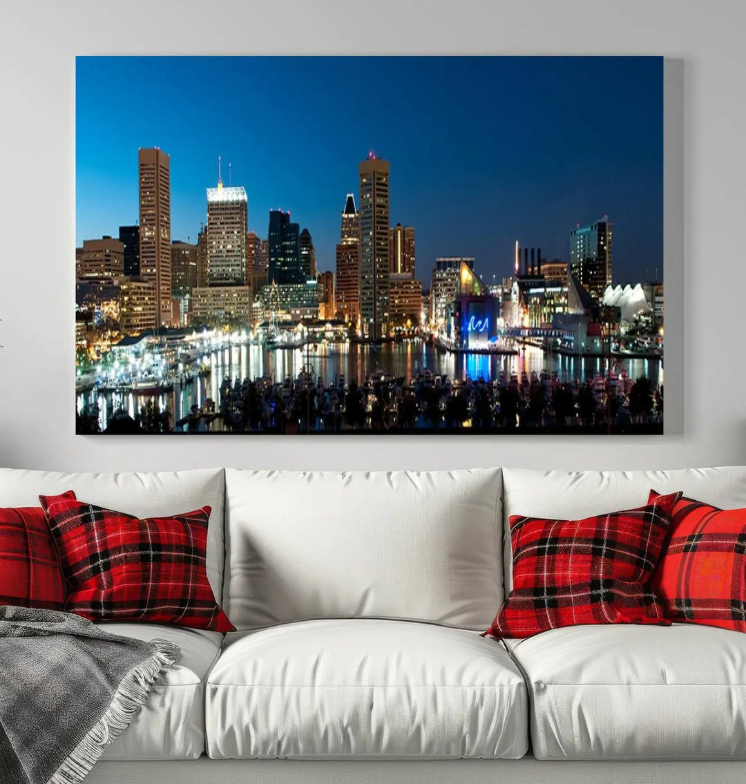 The Baltimore City Lights Night Blue Skyline Wall Art Canvas Print, professionally hand-assembled and ready to hang, graces the wall in this stylish living room.