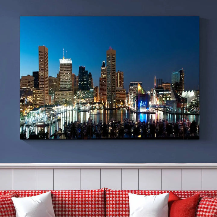 The Baltimore City Lights Night Blue Skyline Wall Art Canvas Print, professionally hand-assembled and ready to hang, graces the wall in this stylish living room.