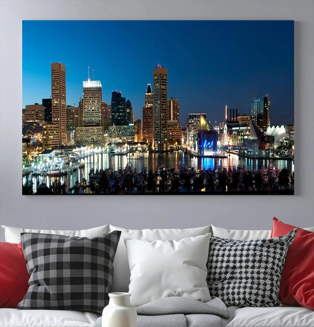 The Baltimore City Lights Night Blue Skyline Wall Art Canvas Print, professionally hand-assembled and ready to hang, graces the wall in this stylish living room.