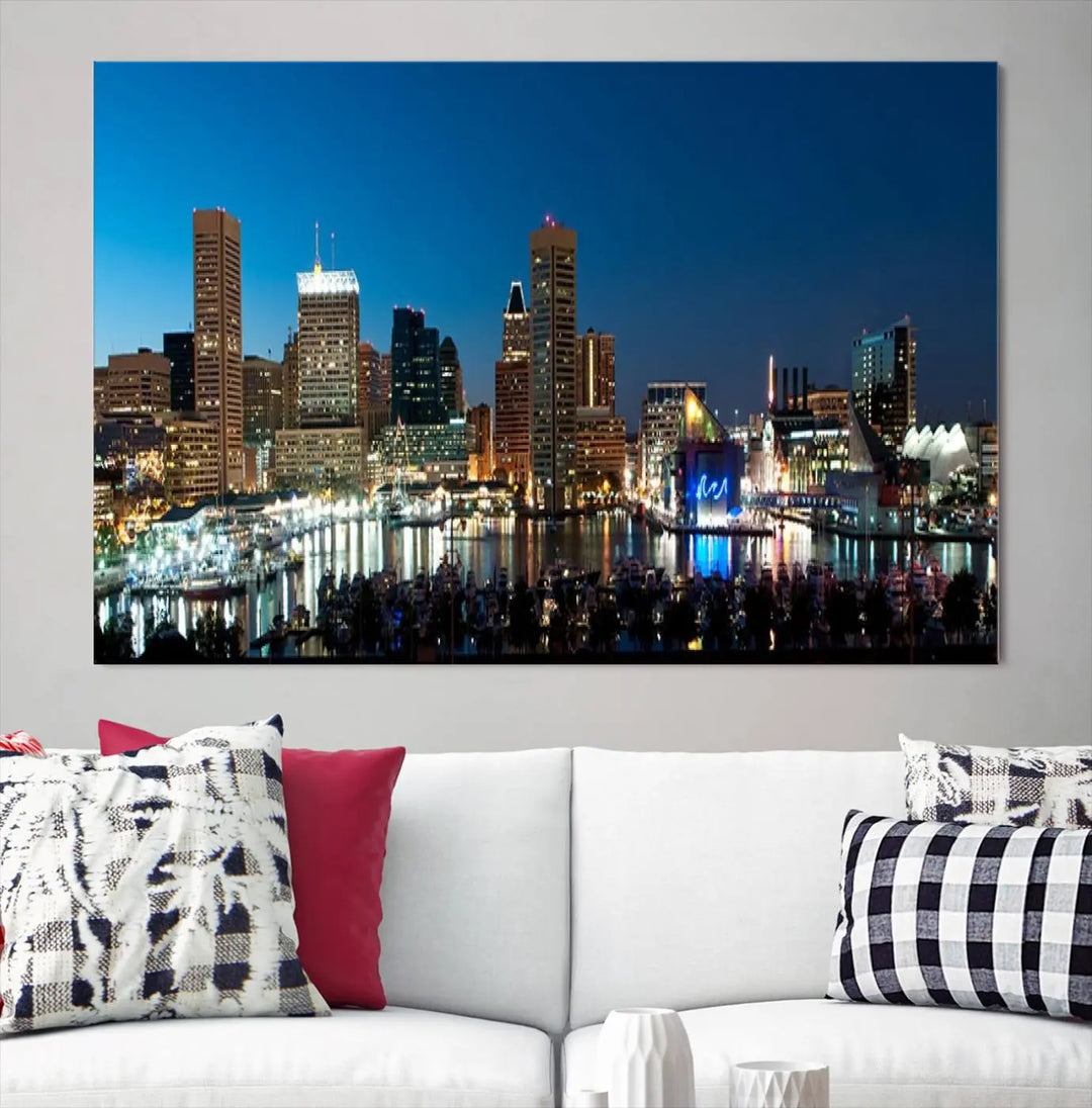 The Baltimore City Lights Night Blue Skyline Wall Art Canvas Print, professionally hand-assembled and ready to hang, graces the wall in this stylish living room.