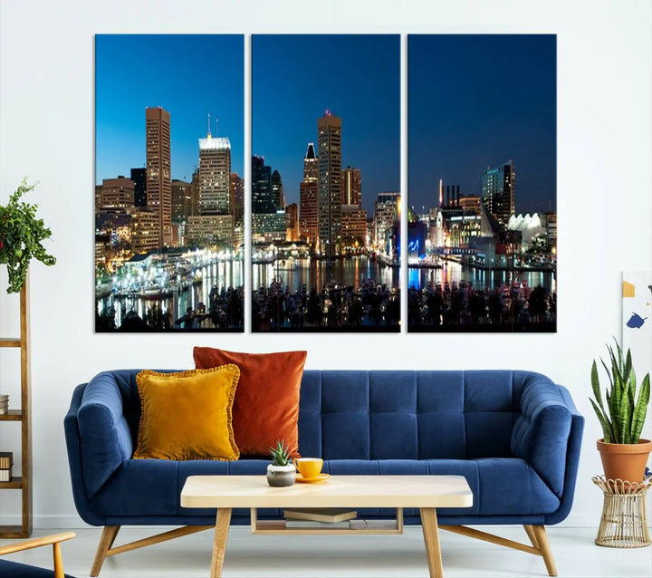 The Baltimore City Lights Night Blue Skyline Wall Art Canvas Print, professionally hand-assembled and ready to hang, graces the wall in this stylish living room.