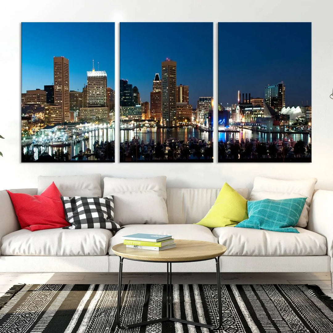 The Baltimore City Lights Night Blue Skyline Wall Art Canvas Print, professionally hand-assembled and ready to hang, graces the wall in this stylish living room.