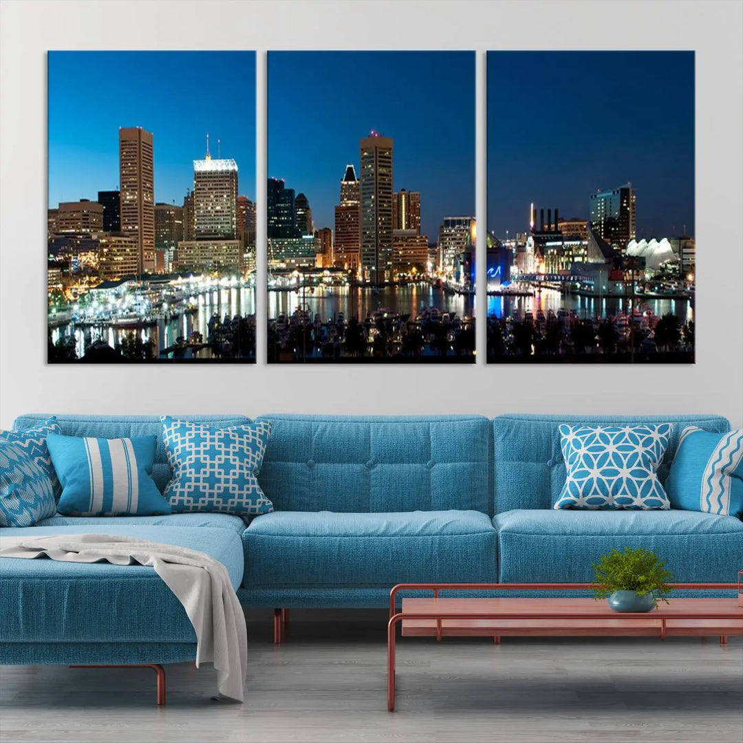 The Baltimore City Lights Night Blue Skyline Wall Art Canvas Print, professionally hand-assembled and ready to hang, graces the wall in this stylish living room.