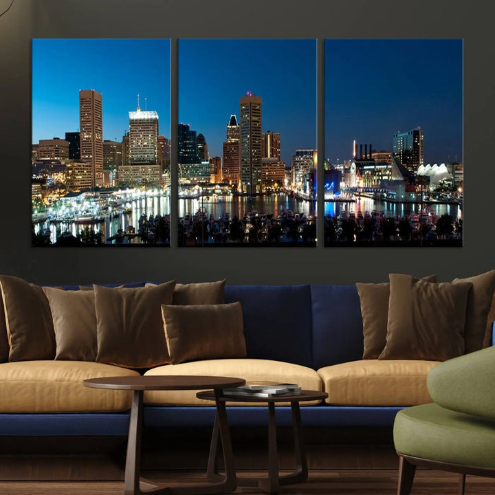 The Baltimore City Lights Night Blue Skyline Wall Art Canvas Print, professionally hand-assembled and ready to hang, graces the wall in this stylish living room.