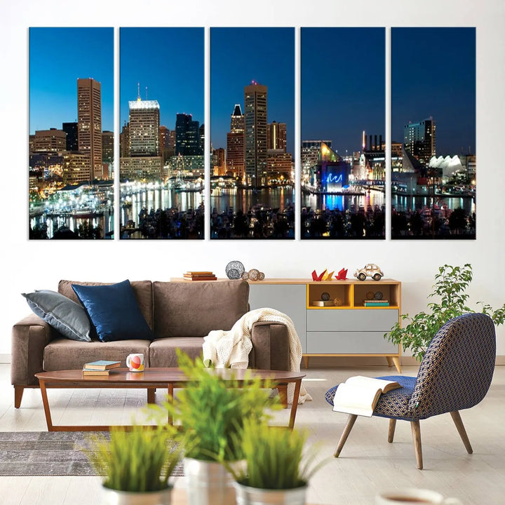 The Baltimore City Lights Night Blue Skyline Wall Art Canvas Print, professionally hand-assembled and ready to hang, graces the wall in this stylish living room.