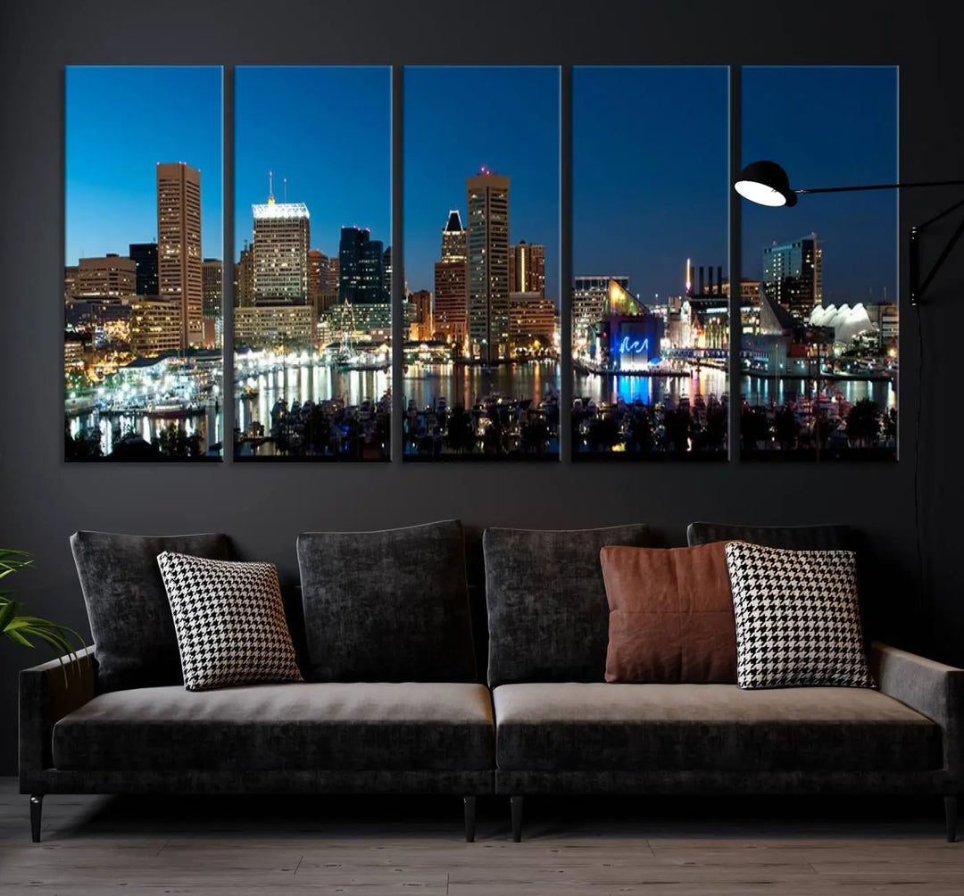 The Baltimore City Lights Night Blue Skyline Wall Art Canvas Print, professionally hand-assembled and ready to hang, graces the wall in this stylish living room.