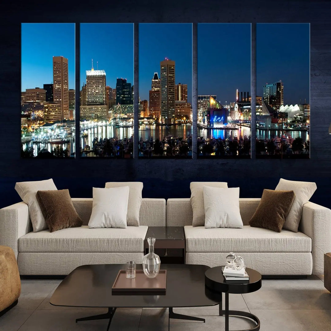 The Baltimore City Lights Night Blue Skyline Wall Art Canvas Print, professionally hand-assembled and ready to hang, graces the wall in this stylish living room.