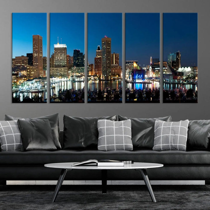 The Baltimore City Lights Night Blue Skyline Wall Art Canvas Print, professionally hand-assembled and ready to hang, graces the wall in this stylish living room.