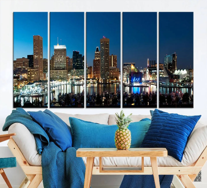 The Baltimore City Lights Night Blue Skyline Wall Art Canvas Print, professionally hand-assembled and ready to hang, graces the wall in this stylish living room.