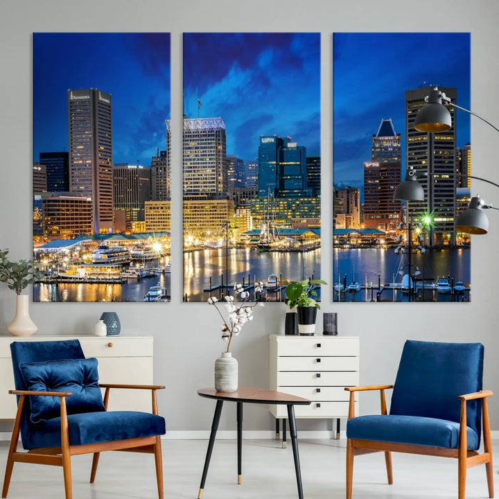 The living room features a nautical-themed triptych wall art on museum-quality canvas, showcasing the "Baltimore City Lights Night Cloudy Blue Skyline Cityscape View Wall Art Canvas Print.