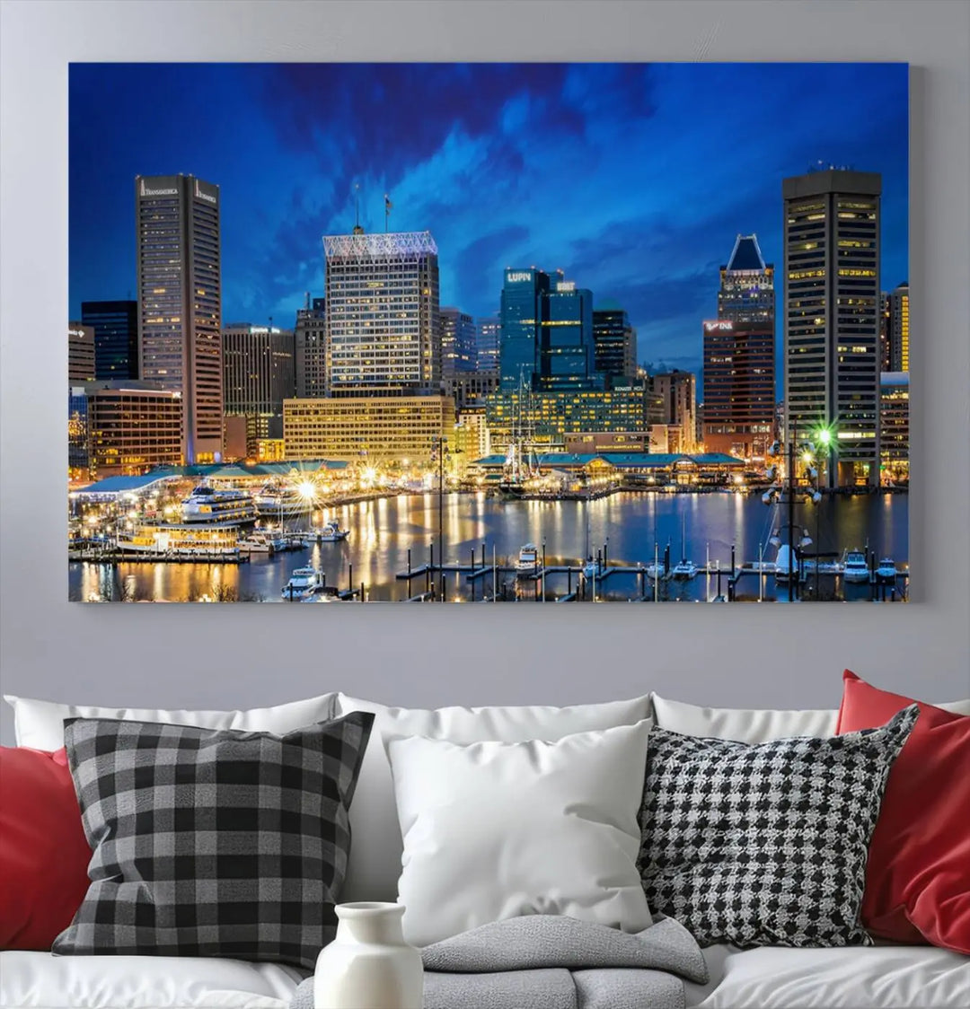 The living room features a nautical-themed triptych wall art on museum-quality canvas, showcasing the "Baltimore City Lights Night Cloudy Blue Skyline Cityscape View Wall Art Canvas Print.