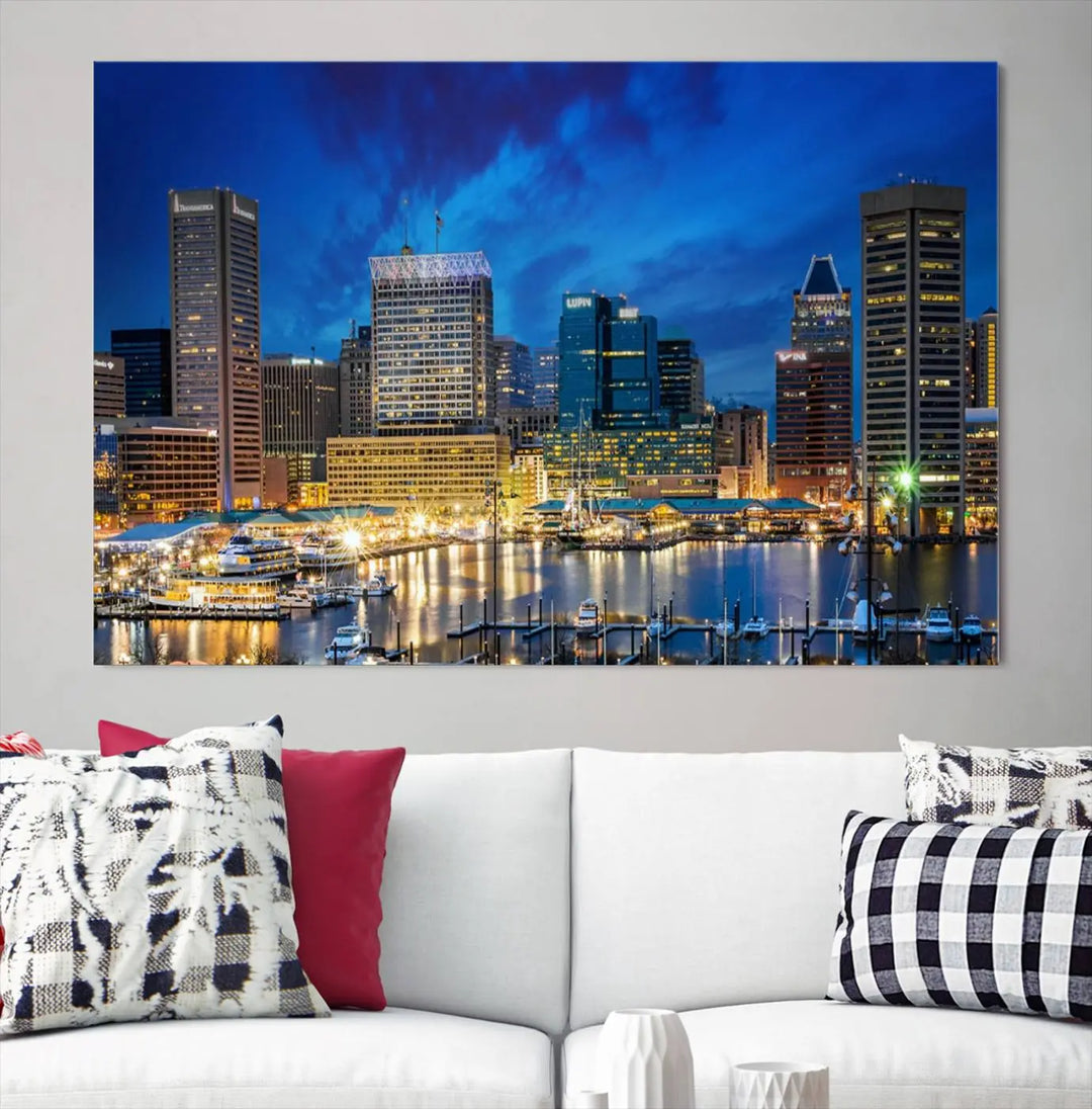 The living room features a nautical-themed triptych wall art on museum-quality canvas, showcasing the "Baltimore City Lights Night Cloudy Blue Skyline Cityscape View Wall Art Canvas Print.