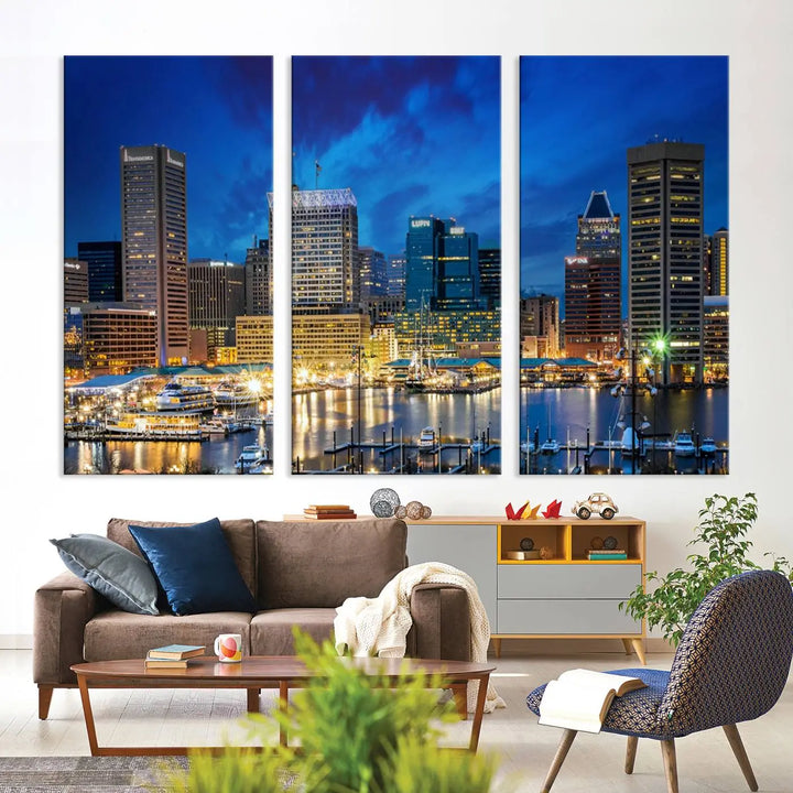 The living room features a nautical-themed triptych wall art on museum-quality canvas, showcasing the "Baltimore City Lights Night Cloudy Blue Skyline Cityscape View Wall Art Canvas Print.