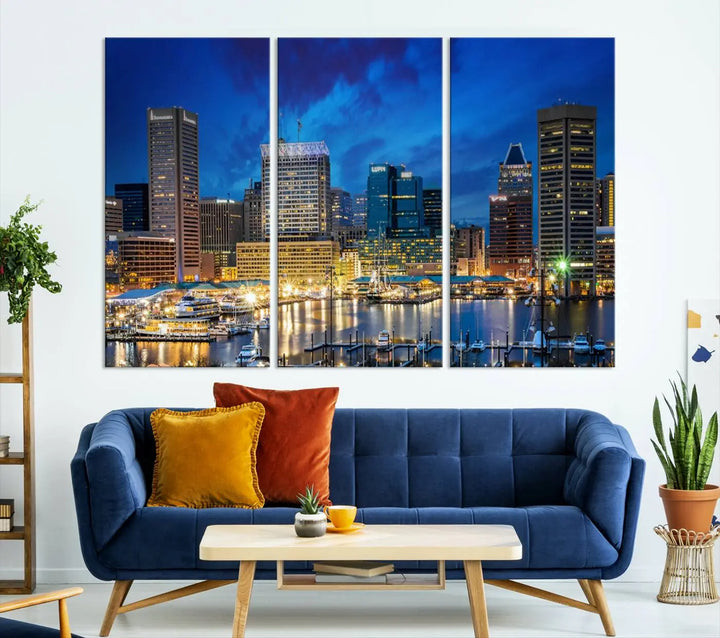 The living room features a nautical-themed triptych wall art on museum-quality canvas, showcasing the "Baltimore City Lights Night Cloudy Blue Skyline Cityscape View Wall Art Canvas Print.