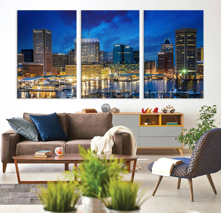 The living room features a nautical-themed triptych wall art on museum-quality canvas, showcasing the "Baltimore City Lights Night Cloudy Blue Skyline Cityscape View Wall Art Canvas Print.