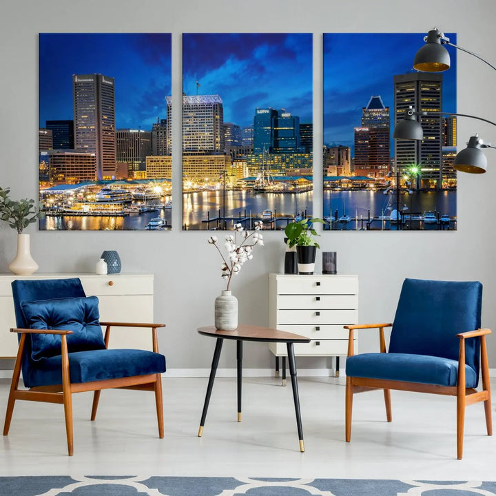 The living room features a nautical-themed triptych wall art on museum-quality canvas, showcasing the "Baltimore City Lights Night Cloudy Blue Skyline Cityscape View Wall Art Canvas Print.