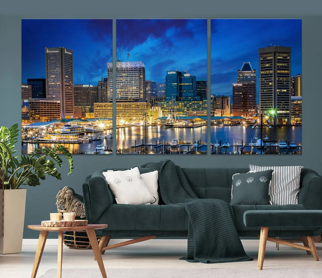 The living room features a nautical-themed triptych wall art on museum-quality canvas, showcasing the "Baltimore City Lights Night Cloudy Blue Skyline Cityscape View Wall Art Canvas Print.