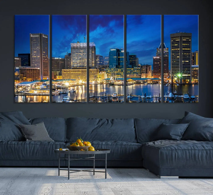 The living room features a nautical-themed triptych wall art on museum-quality canvas, showcasing the "Baltimore City Lights Night Cloudy Blue Skyline Cityscape View Wall Art Canvas Print.