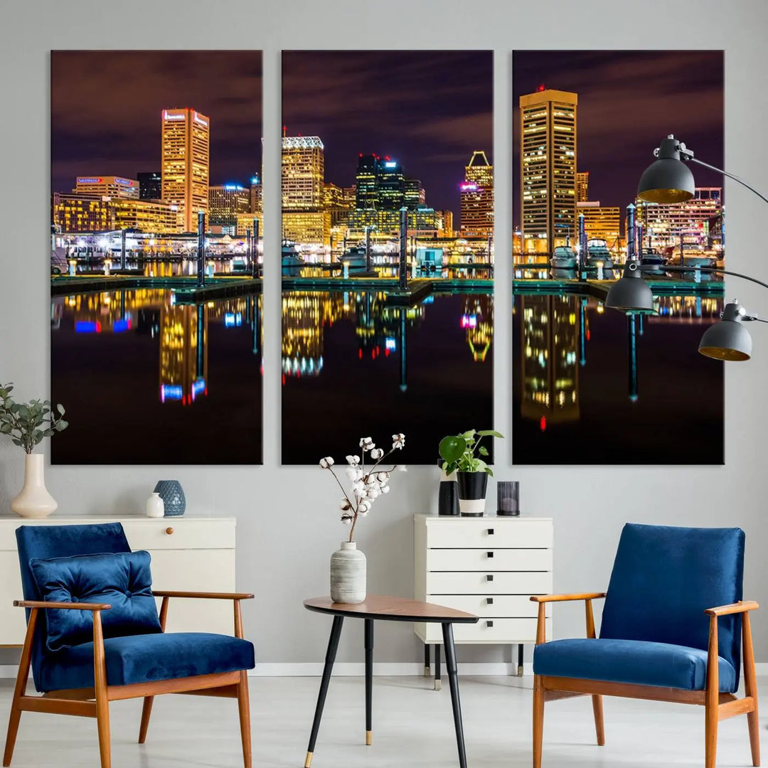 The Baltimore City Lights Night Purple Skyline Cityscape View Wall Art Canvas Print is a triptych showcasing a vibrant city skyline reflected on water. This artwork, crafted on museum-quality canvas and hand-assembled, adds sophistication and charm to any space while celebrating artistry made in the USA.