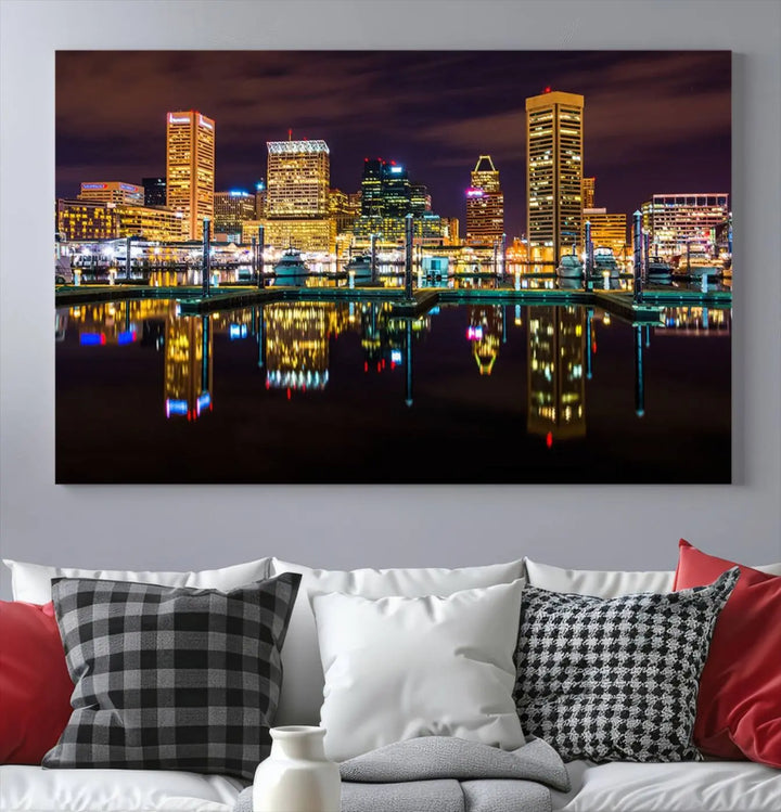 The Baltimore City Lights Night Purple Skyline Cityscape View Wall Art Canvas Print is a triptych showcasing a vibrant city skyline reflected on water. This artwork, crafted on museum-quality canvas and hand-assembled, adds sophistication and charm to any space while celebrating artistry made in the USA.