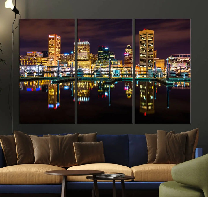 The Baltimore City Lights Night Purple Skyline Cityscape View Wall Art Canvas Print is a triptych showcasing a vibrant city skyline reflected on water. This artwork, crafted on museum-quality canvas and hand-assembled, adds sophistication and charm to any space while celebrating artistry made in the USA.