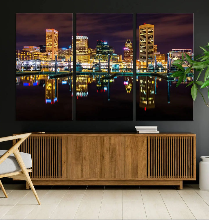 The Baltimore City Lights Night Purple Skyline Cityscape View Wall Art Canvas Print is a triptych showcasing a vibrant city skyline reflected on water. This artwork, crafted on museum-quality canvas and hand-assembled, adds sophistication and charm to any space while celebrating artistry made in the USA.