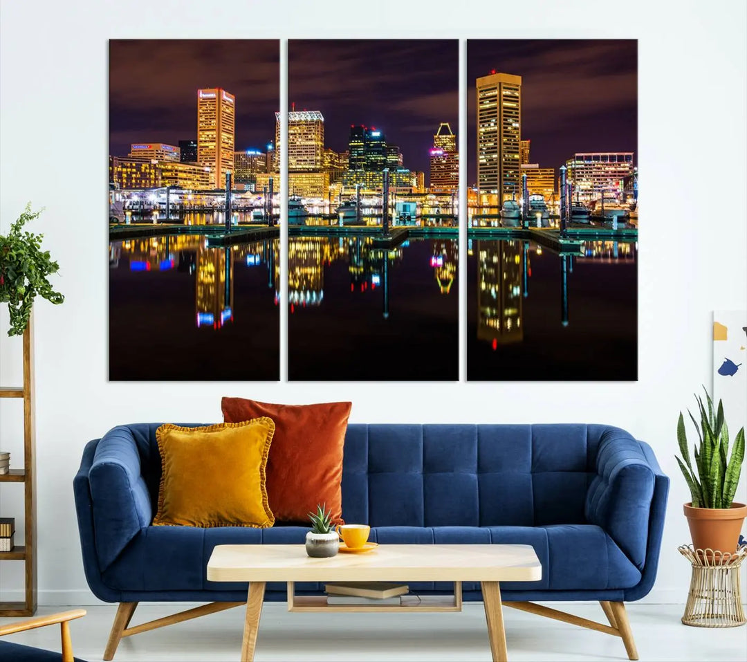 The Baltimore City Lights Night Purple Skyline Cityscape View Wall Art Canvas Print is a triptych showcasing a vibrant city skyline reflected on water. This artwork, crafted on museum-quality canvas and hand-assembled, adds sophistication and charm to any space while celebrating artistry made in the USA.