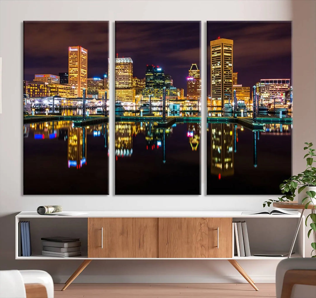 The Baltimore City Lights Night Purple Skyline Cityscape View Wall Art Canvas Print is a triptych showcasing a vibrant city skyline reflected on water. This artwork, crafted on museum-quality canvas and hand-assembled, adds sophistication and charm to any space while celebrating artistry made in the USA.