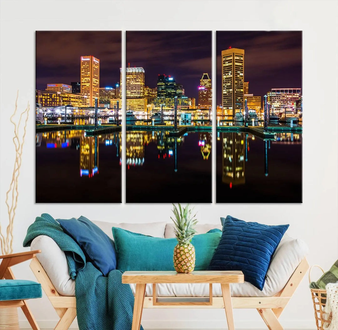 The Baltimore City Lights Night Purple Skyline Cityscape View Wall Art Canvas Print is a triptych showcasing a vibrant city skyline reflected on water. This artwork, crafted on museum-quality canvas and hand-assembled, adds sophistication and charm to any space while celebrating artistry made in the USA.