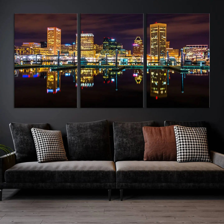 The Baltimore City Lights Night Purple Skyline Cityscape View Wall Art Canvas Print is a triptych showcasing a vibrant city skyline reflected on water. This artwork, crafted on museum-quality canvas and hand-assembled, adds sophistication and charm to any space while celebrating artistry made in the USA.