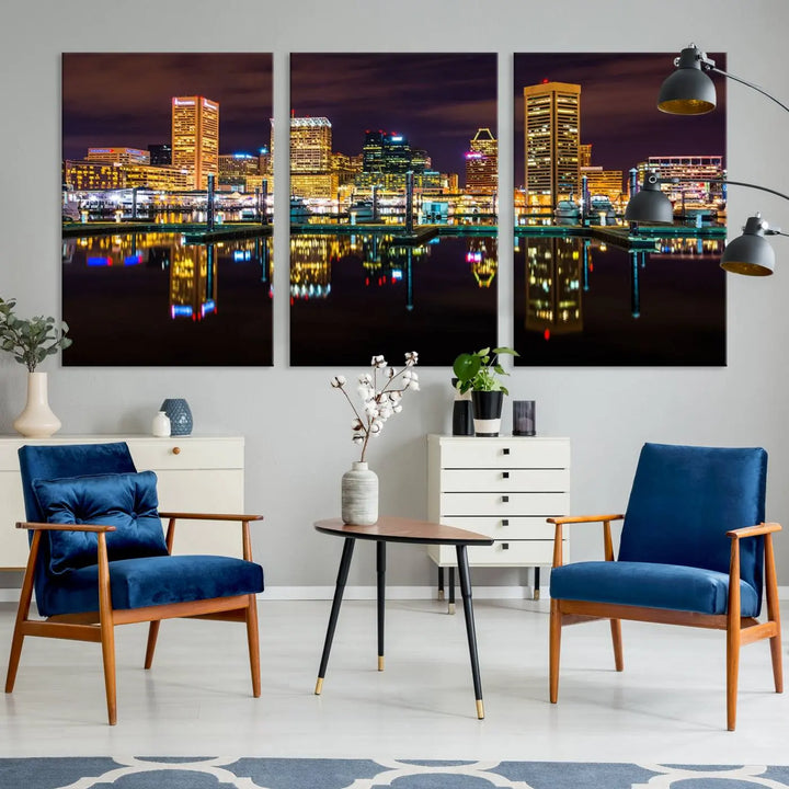 The Baltimore City Lights Night Purple Skyline Cityscape View Wall Art Canvas Print is a triptych showcasing a vibrant city skyline reflected on water. This artwork, crafted on museum-quality canvas and hand-assembled, adds sophistication and charm to any space while celebrating artistry made in the USA.