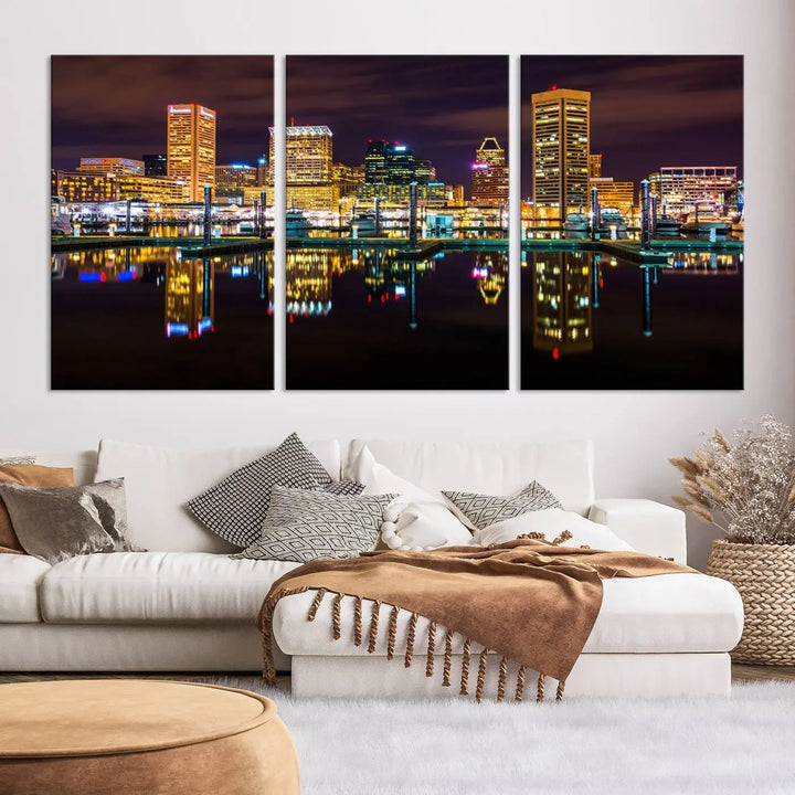 The Baltimore City Lights Night Purple Skyline Cityscape View Wall Art Canvas Print is a triptych showcasing a vibrant city skyline reflected on water. This artwork, crafted on museum-quality canvas and hand-assembled, adds sophistication and charm to any space while celebrating artistry made in the USA.