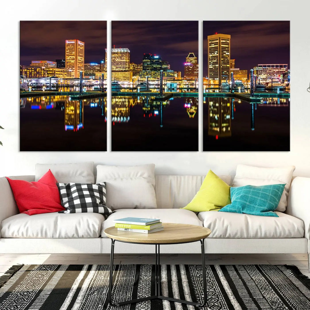 The Baltimore City Lights Night Purple Skyline Cityscape View Wall Art Canvas Print is a triptych showcasing a vibrant city skyline reflected on water. This artwork, crafted on museum-quality canvas and hand-assembled, adds sophistication and charm to any space while celebrating artistry made in the USA.