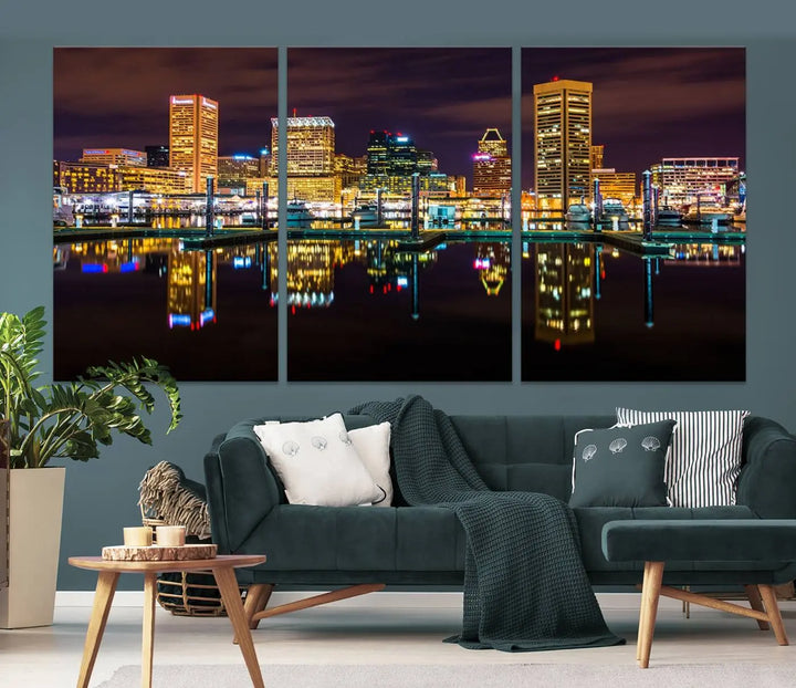 The Baltimore City Lights Night Purple Skyline Cityscape View Wall Art Canvas Print is a triptych showcasing a vibrant city skyline reflected on water. This artwork, crafted on museum-quality canvas and hand-assembled, adds sophistication and charm to any space while celebrating artistry made in the USA.