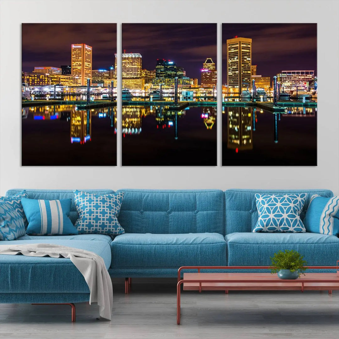 The Baltimore City Lights Night Purple Skyline Cityscape View Wall Art Canvas Print is a triptych showcasing a vibrant city skyline reflected on water. This artwork, crafted on museum-quality canvas and hand-assembled, adds sophistication and charm to any space while celebrating artistry made in the USA.