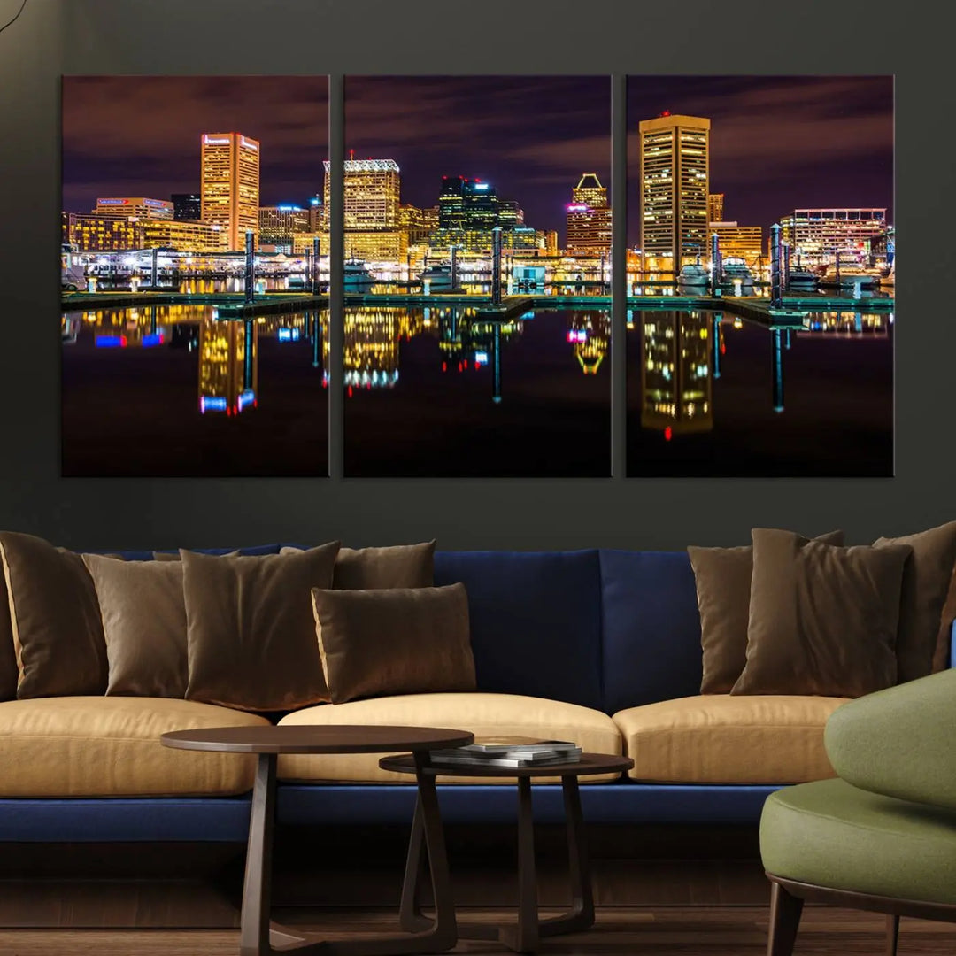 The Baltimore City Lights Night Purple Skyline Cityscape View Wall Art Canvas Print is a triptych showcasing a vibrant city skyline reflected on water. This artwork, crafted on museum-quality canvas and hand-assembled, adds sophistication and charm to any space while celebrating artistry made in the USA.