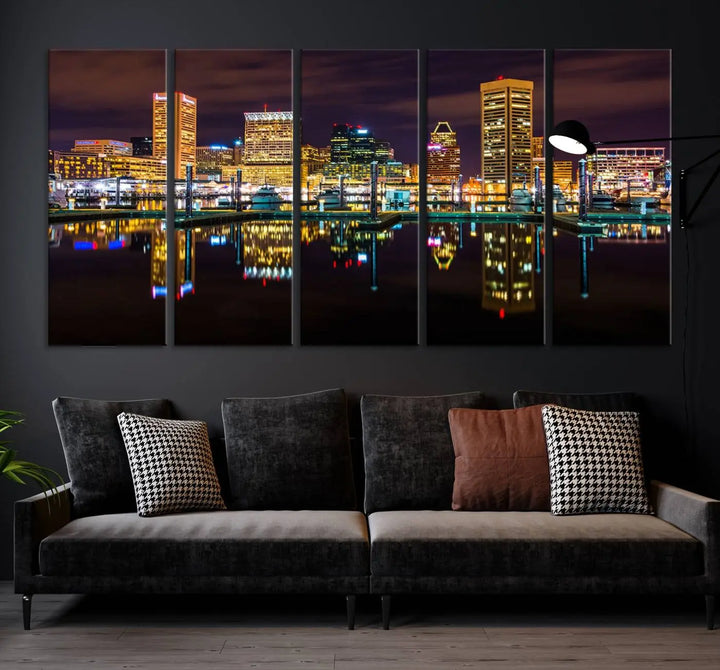 The Baltimore City Lights Night Purple Skyline Cityscape View Wall Art Canvas Print is a triptych showcasing a vibrant city skyline reflected on water. This artwork, crafted on museum-quality canvas and hand-assembled, adds sophistication and charm to any space while celebrating artistry made in the USA.