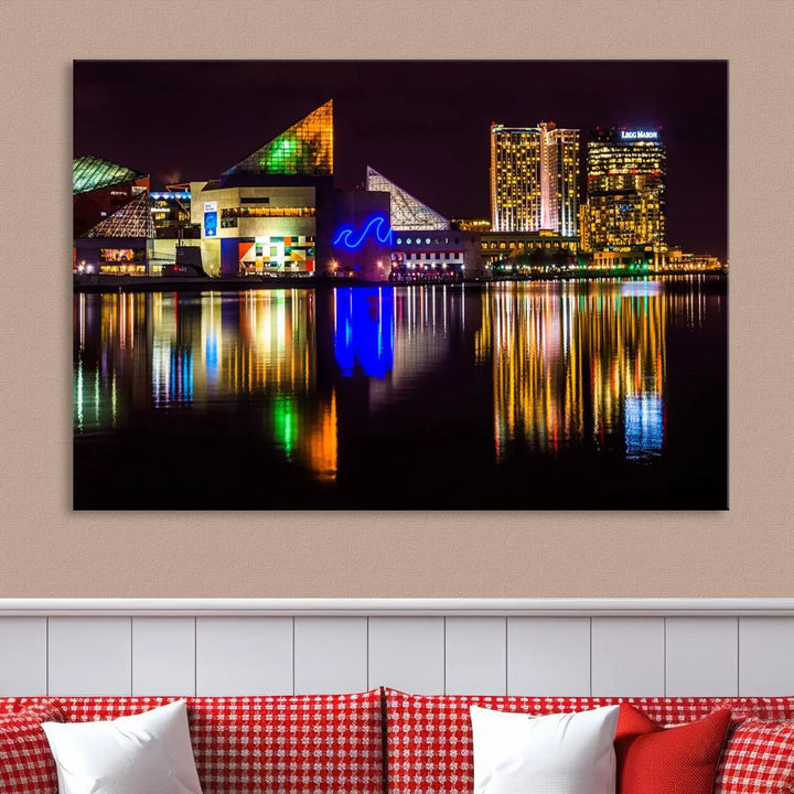 A set of museum-quality canvases featuring the "Baltimore City Lights Night Skyline Cityscape View Wall Art Canvas Print" showcases a vibrant nighttime cityscape with colorful reflections on water. The canvases are elegantly presented with gallery-wrapped edges for a polished look.