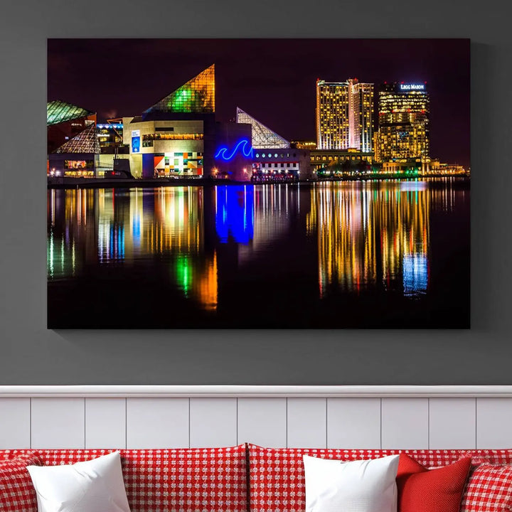 A set of museum-quality canvases featuring the "Baltimore City Lights Night Skyline Cityscape View Wall Art Canvas Print" showcases a vibrant nighttime cityscape with colorful reflections on water. The canvases are elegantly presented with gallery-wrapped edges for a polished look.