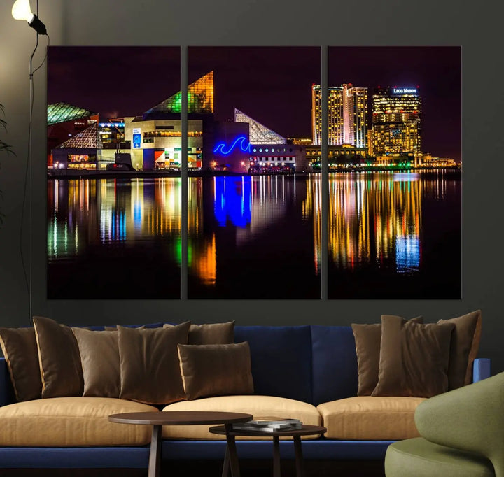 A set of museum-quality canvases featuring the "Baltimore City Lights Night Skyline Cityscape View Wall Art Canvas Print" showcases a vibrant nighttime cityscape with colorful reflections on water. The canvases are elegantly presented with gallery-wrapped edges for a polished look.