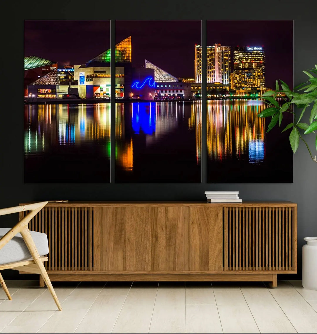 A set of museum-quality canvases featuring the "Baltimore City Lights Night Skyline Cityscape View Wall Art Canvas Print" showcases a vibrant nighttime cityscape with colorful reflections on water. The canvases are elegantly presented with gallery-wrapped edges for a polished look.