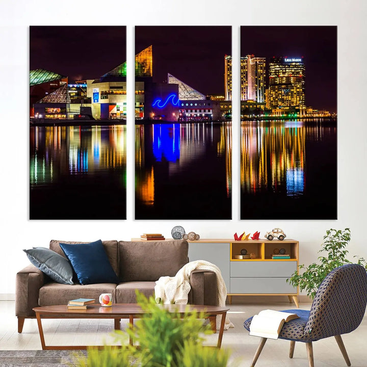 A set of museum-quality canvases featuring the "Baltimore City Lights Night Skyline Cityscape View Wall Art Canvas Print" showcases a vibrant nighttime cityscape with colorful reflections on water. The canvases are elegantly presented with gallery-wrapped edges for a polished look.