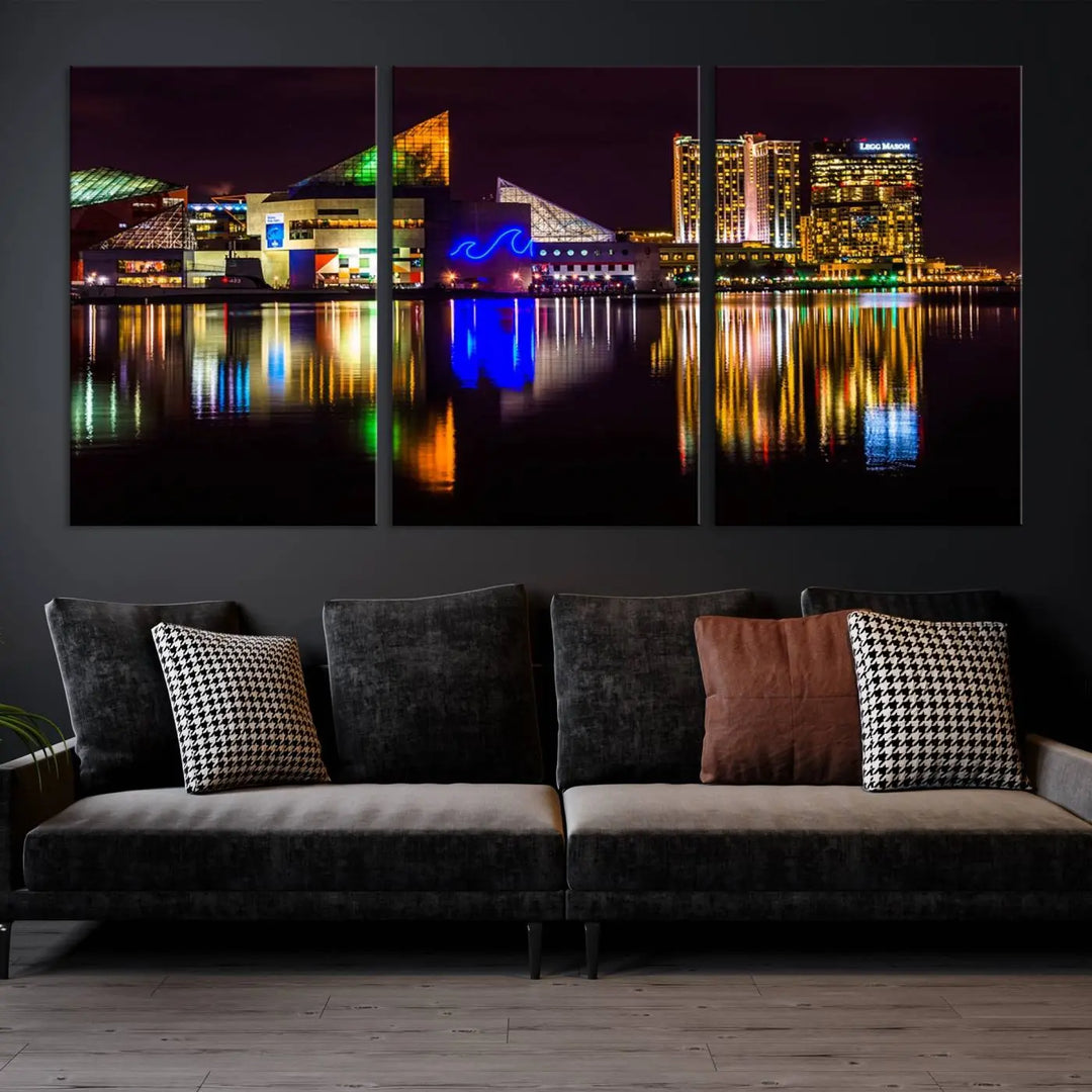 A set of museum-quality canvases featuring the "Baltimore City Lights Night Skyline Cityscape View Wall Art Canvas Print" showcases a vibrant nighttime cityscape with colorful reflections on water. The canvases are elegantly presented with gallery-wrapped edges for a polished look.