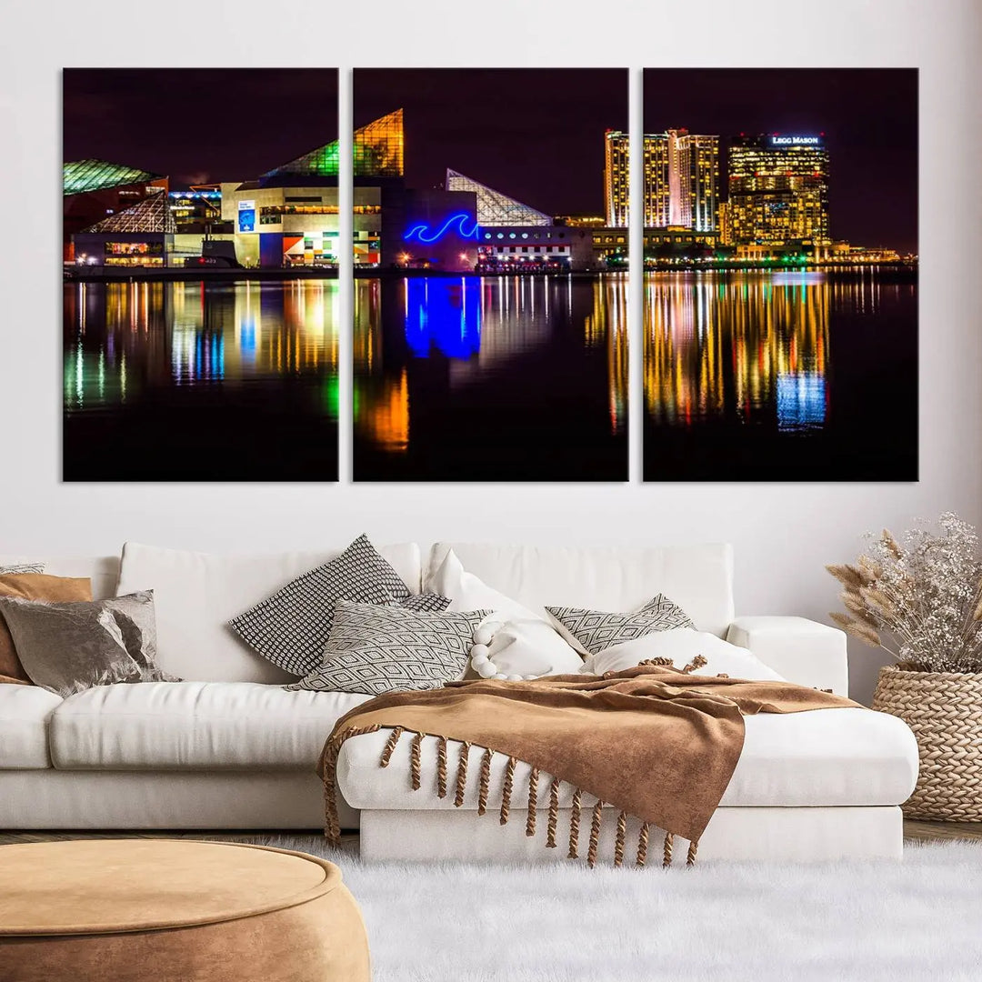 A set of museum-quality canvases featuring the "Baltimore City Lights Night Skyline Cityscape View Wall Art Canvas Print" showcases a vibrant nighttime cityscape with colorful reflections on water. The canvases are elegantly presented with gallery-wrapped edges for a polished look.