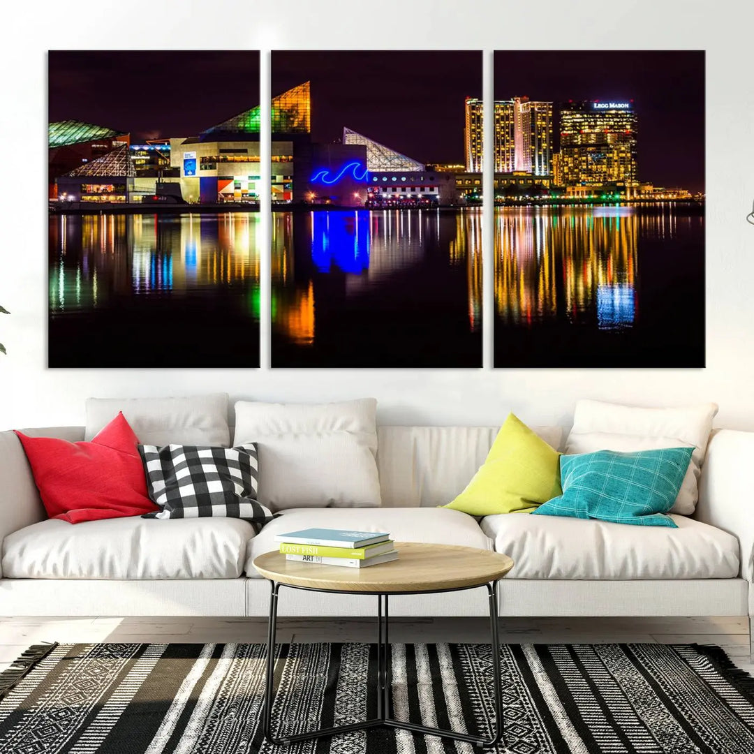 A set of museum-quality canvases featuring the "Baltimore City Lights Night Skyline Cityscape View Wall Art Canvas Print" showcases a vibrant nighttime cityscape with colorful reflections on water. The canvases are elegantly presented with gallery-wrapped edges for a polished look.