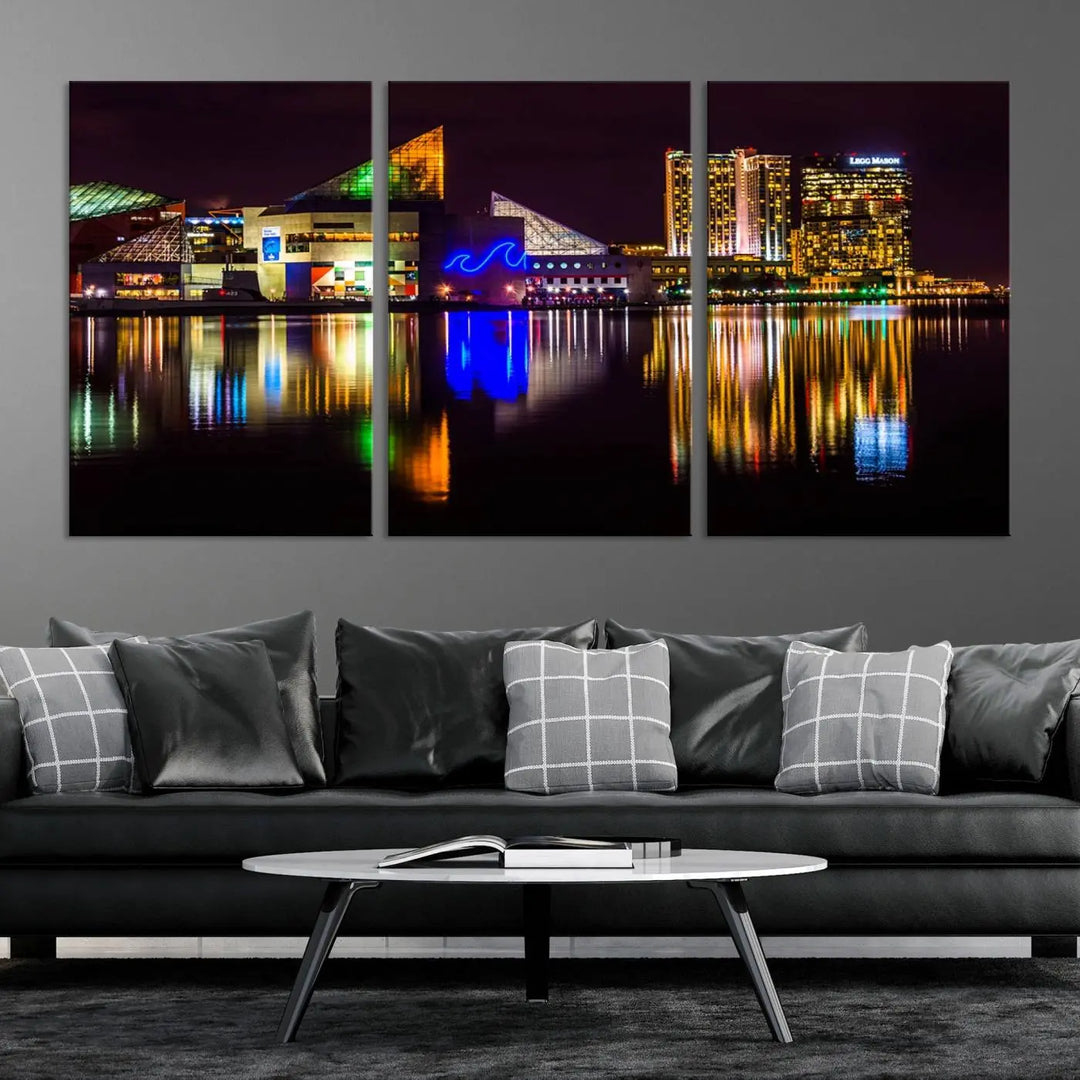 A set of museum-quality canvases featuring the "Baltimore City Lights Night Skyline Cityscape View Wall Art Canvas Print" showcases a vibrant nighttime cityscape with colorful reflections on water. The canvases are elegantly presented with gallery-wrapped edges for a polished look.