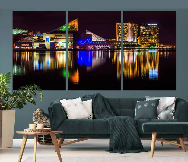 A set of museum-quality canvases featuring the "Baltimore City Lights Night Skyline Cityscape View Wall Art Canvas Print" showcases a vibrant nighttime cityscape with colorful reflections on water. The canvases are elegantly presented with gallery-wrapped edges for a polished look.