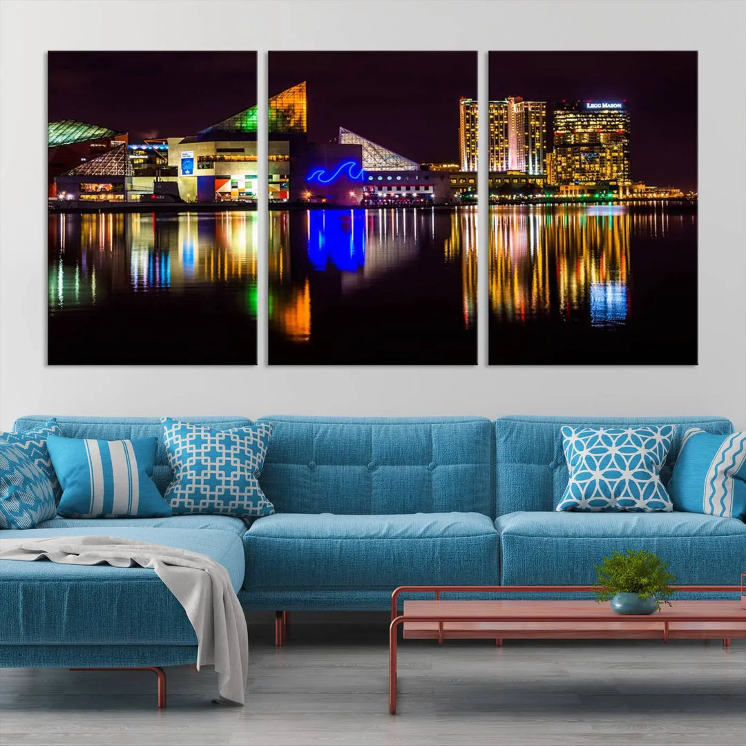 A set of museum-quality canvases featuring the "Baltimore City Lights Night Skyline Cityscape View Wall Art Canvas Print" showcases a vibrant nighttime cityscape with colorful reflections on water. The canvases are elegantly presented with gallery-wrapped edges for a polished look.