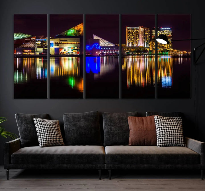 A set of museum-quality canvases featuring the "Baltimore City Lights Night Skyline Cityscape View Wall Art Canvas Print" showcases a vibrant nighttime cityscape with colorful reflections on water. The canvases are elegantly presented with gallery-wrapped edges for a polished look.